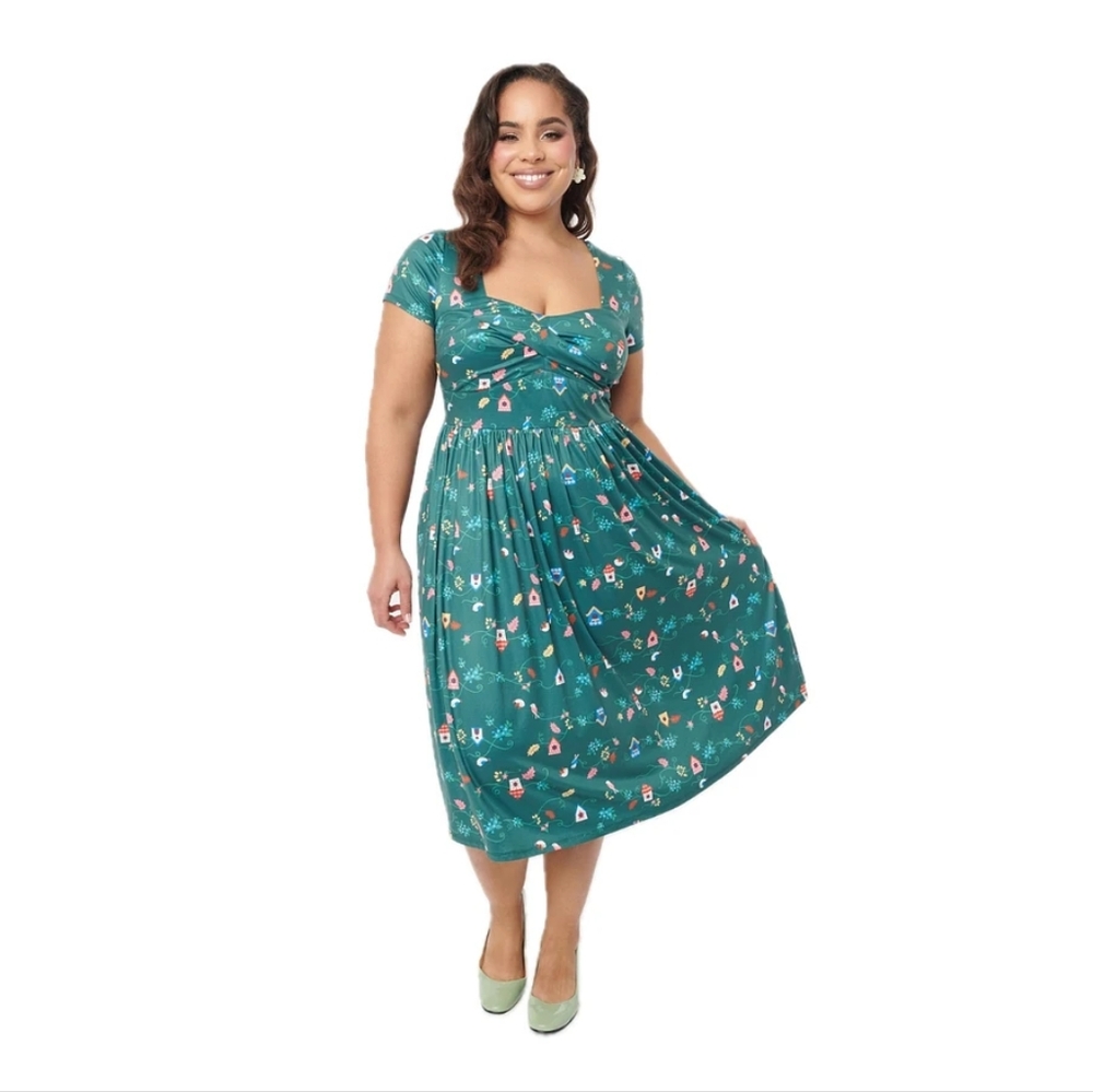 Unique vintage twist front 50s style swing dress